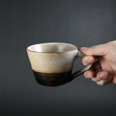 Hanging cup by Yukiko Tsuchiya