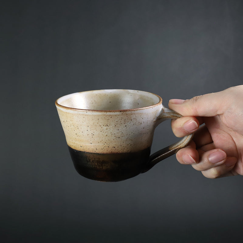 Hanging cup by Yukiko Tsuchiya