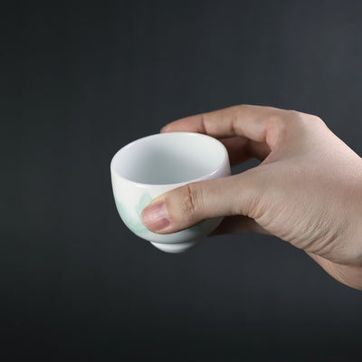 Manji Inoue's work, white porcelain, green glaze, magnolia carving design sake cup (small)