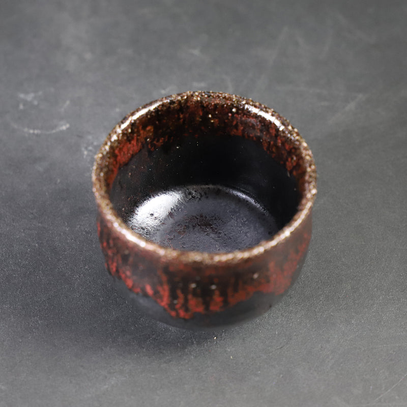 Karatsu black and red sake cup made by the 14th generation Nakazato Tarouemon