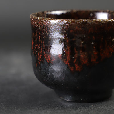 Karatsu black and red sake cup made by the 14th generation Nakazato Tarouemon
