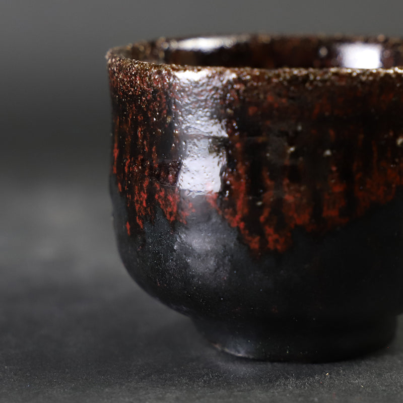 Karatsu black and red sake cup made by the 14th generation Nakazato Tarouemon