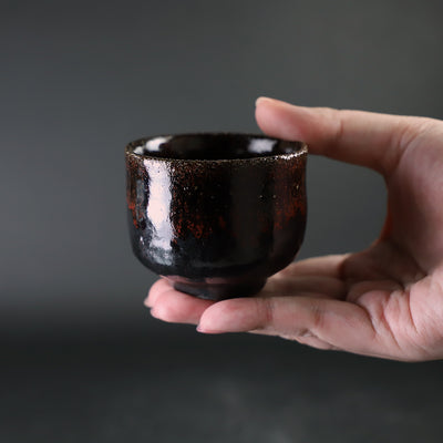 Karatsu black and red sake cup made by the 14th generation Nakazato Tarouemon