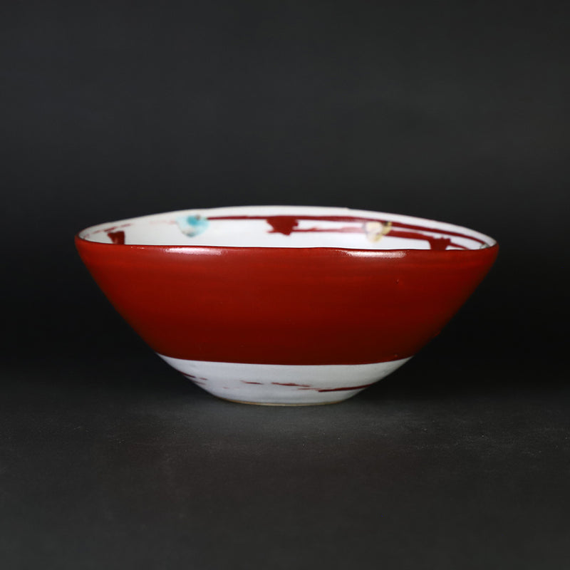 Red-painted dot patterned shoe-mounted bowl by Shingo Oka