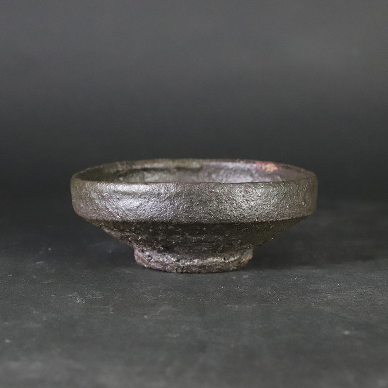 Black Karatsu sake cup by Kota Tanaka