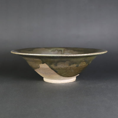Yukiko Tsuchiya's work Black Karatsu-rimmed plate with kiln change