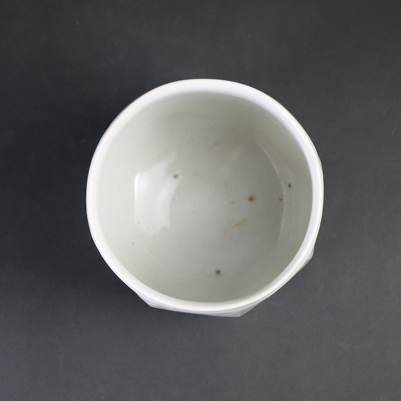 White porcelain teacup with beveled edges by Shingo Oka
