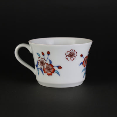 Imaemon kiln tea bowl with brocade cherry blossom painting