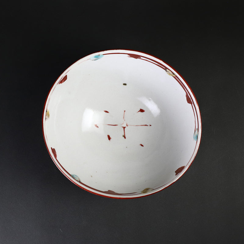 Red-painted dot patterned shoe-mounted bowl by Shingo Oka
