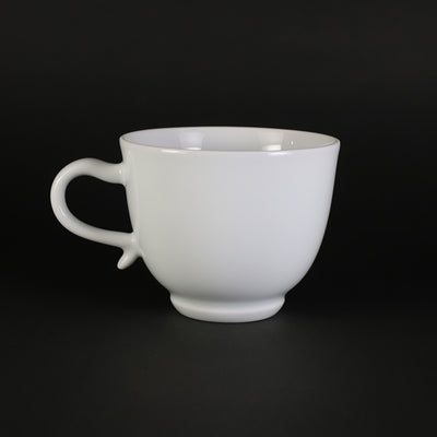 Inoue Manji Kiln White porcelain coffee bowl with bamboo leaf motif