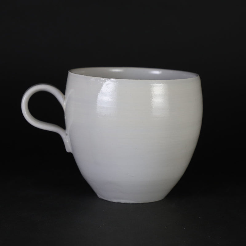 White porcelain cup and saucer by Masahiro Takehana