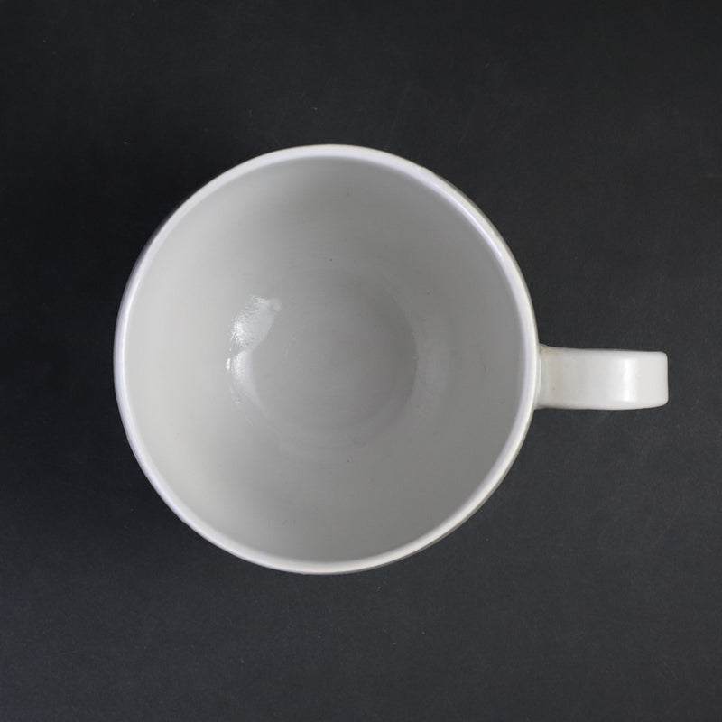 White porcelain cup and saucer by Masahiro Takehana