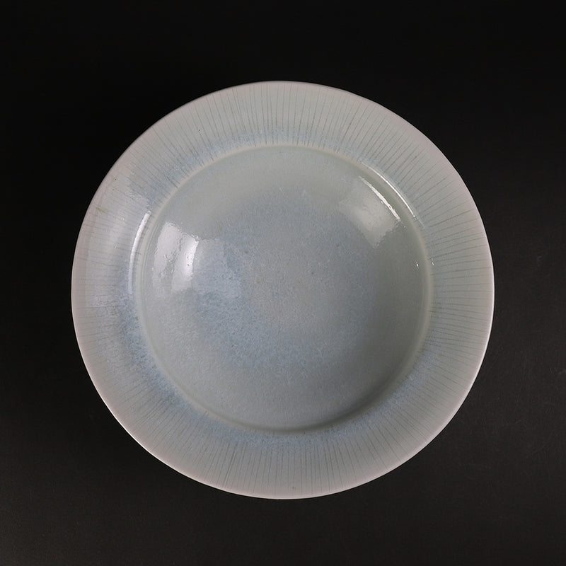 Oval bowl with blue and white porcelain ridges by Shuichi Okamoto