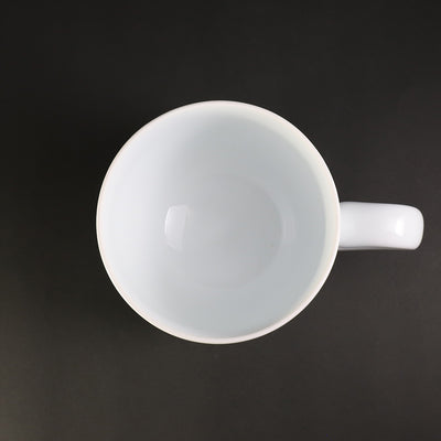White porcelain morning cup with blue sea wave pattern by Manji Inoue