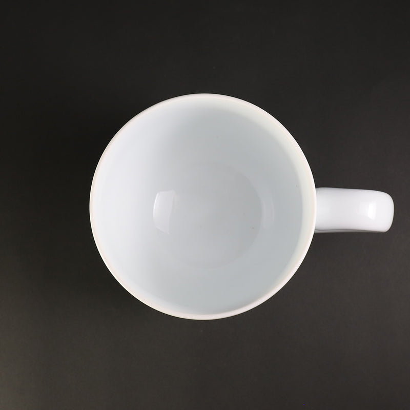 White porcelain morning cup with blue sea wave pattern by Manji Inoue