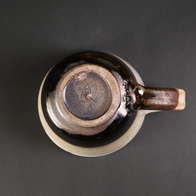 Hanging cup by Yukiko Tsuchiya
