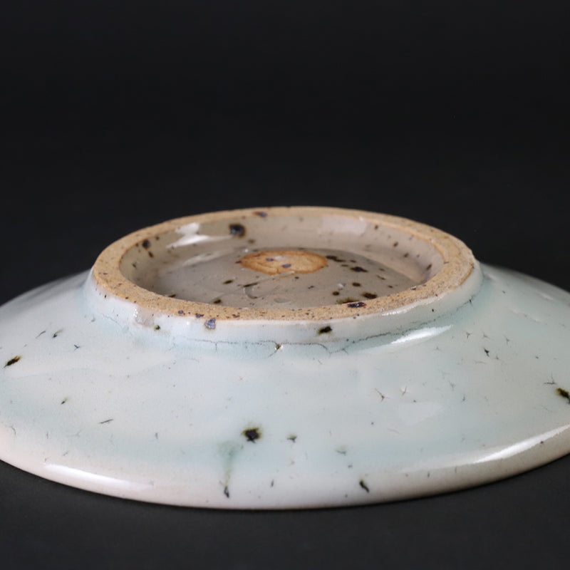A small plate with blue and white glaze by Nakazato Taki