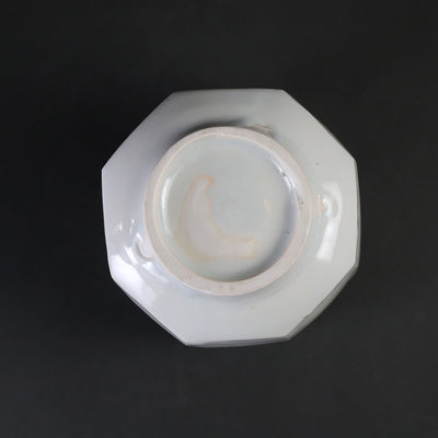 White porcelain teacup with beveled edges by Shingo Oka