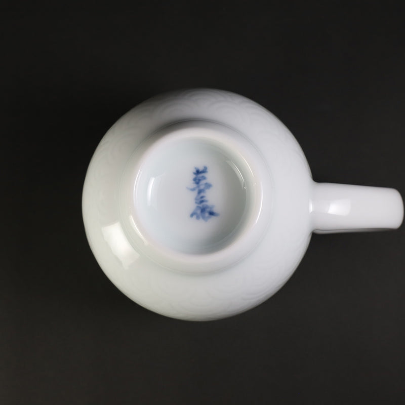 White porcelain morning cup with blue sea wave pattern by Manji Inoue