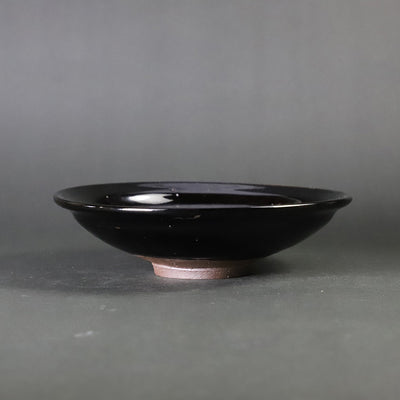 Deep black glaze dish by Taki Nakazato