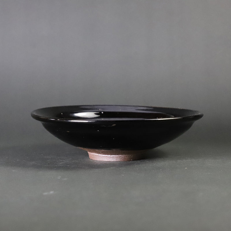 Deep black glaze dish by Taki Nakazato