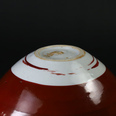 Red-painted dot patterned shoe-mounted bowl by Shingo Oka