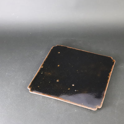 Set of black Karatsu arhat plates by Munehiko Maruta