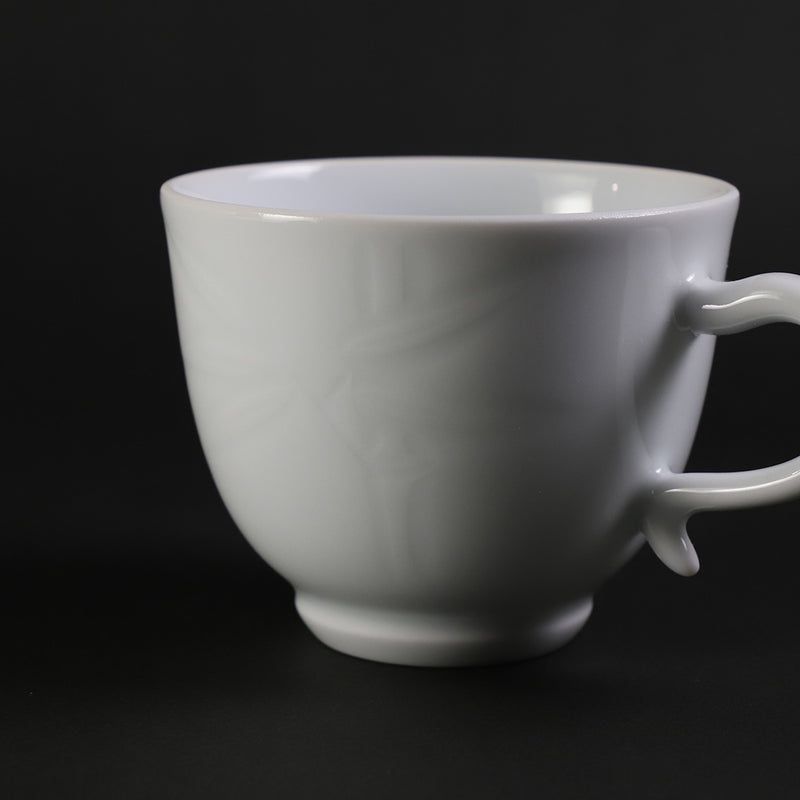 Inoue Manji Kiln White porcelain coffee bowl with bamboo leaf motif