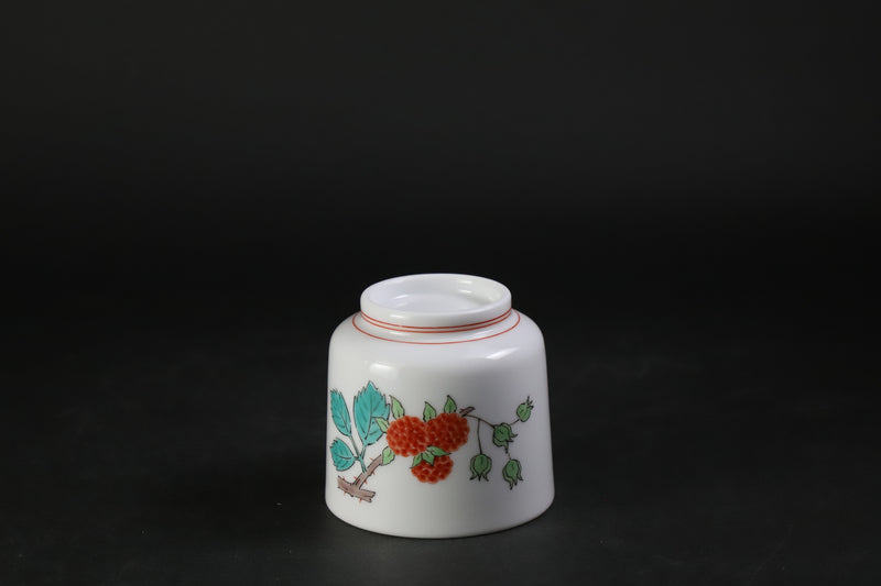 A sake cup with a strawberry design by the 15th generation Sakaida Kakiemon