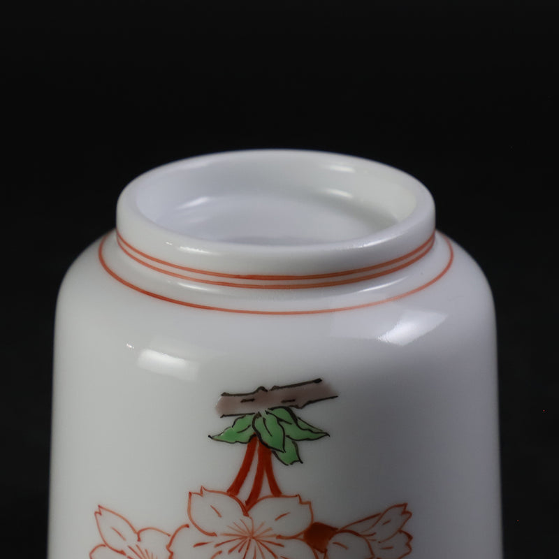 A murky-hand cherry blossom design sake cup made by the 15th generation Sakaida Kakiemon