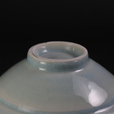 Oval bowl with blue and white porcelain ridges by Shuichi Okamoto