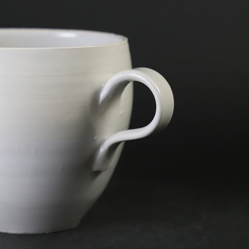 White porcelain cup and saucer by Masahiro Takehana