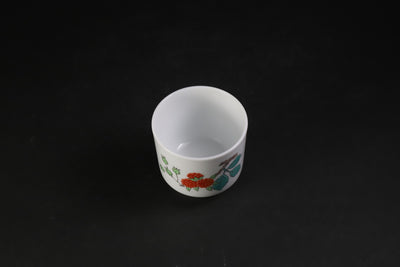 A sake cup with a strawberry design by the 15th generation Sakaida Kakiemon