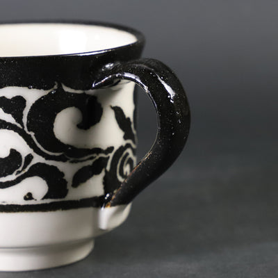 Karatsu porcelain bowl and plate with black and white base with scratches, made by the 14th generation Nakazato Tarouemon