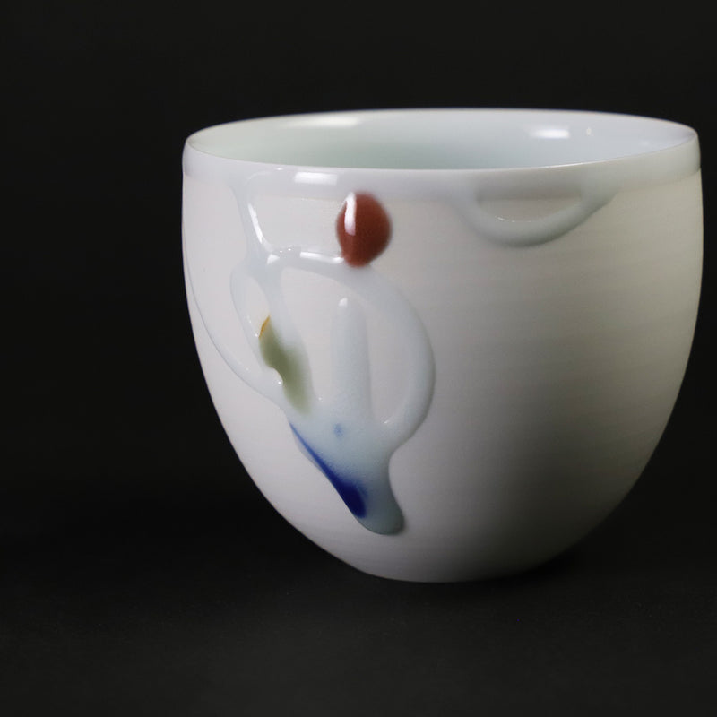 A cup of sake by Akio Momota
