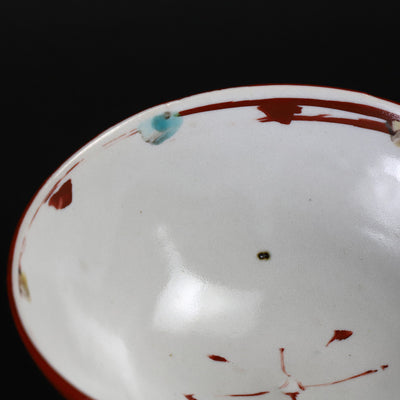Red-painted dot patterned shoe-mounted bowl by Shingo Oka