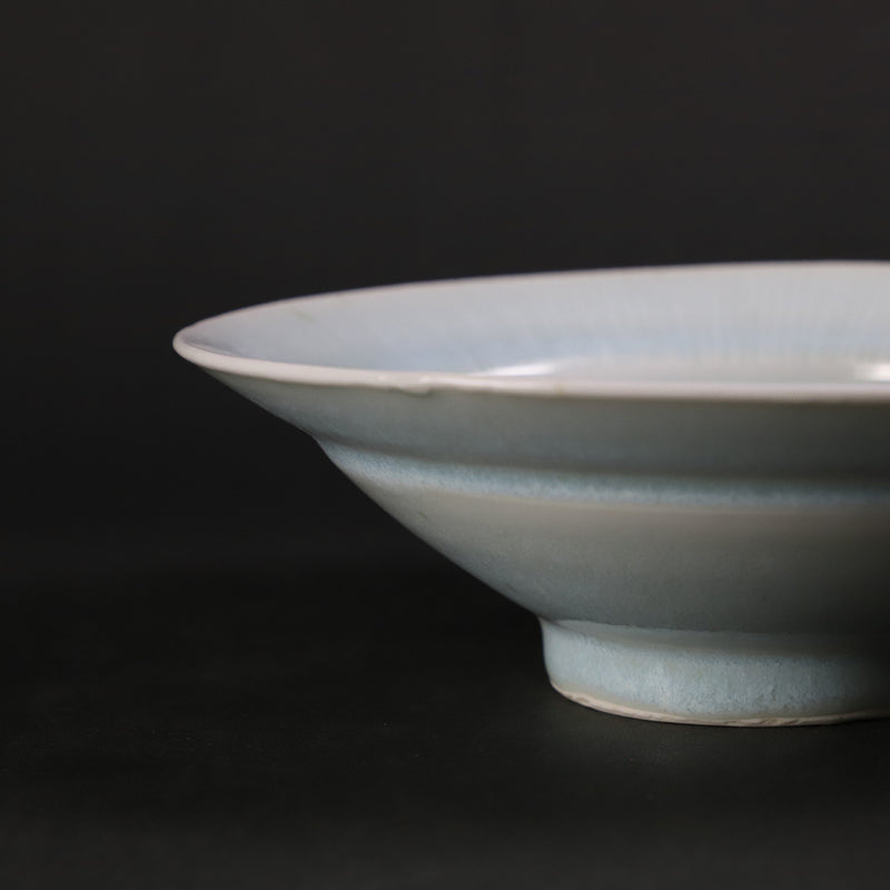 Oval bowl with blue and white porcelain ridges by Shuichi Okamoto