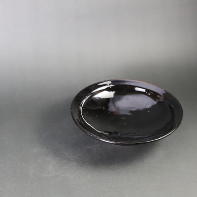 Deep black glaze dish by Taki Nakazato
