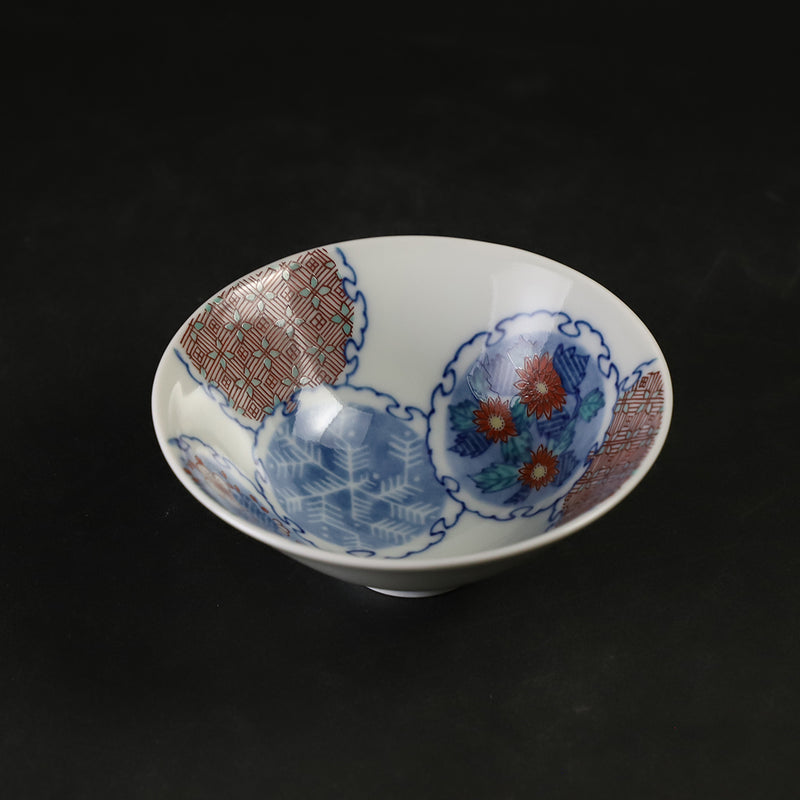 A colored, indigo-colored, ink-splattered, floral design cup by the 14th generation Imaizumi Imaemon