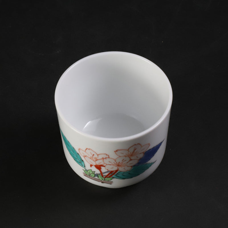 A murky-hand cherry blossom design sake cup made by the 15th generation Sakaida Kakiemon