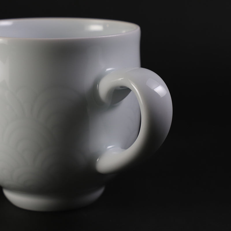 White porcelain morning cup with blue sea wave pattern by Manji Inoue