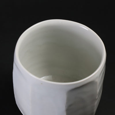 White porcelain teacup with beveled edges by Shingo Oka