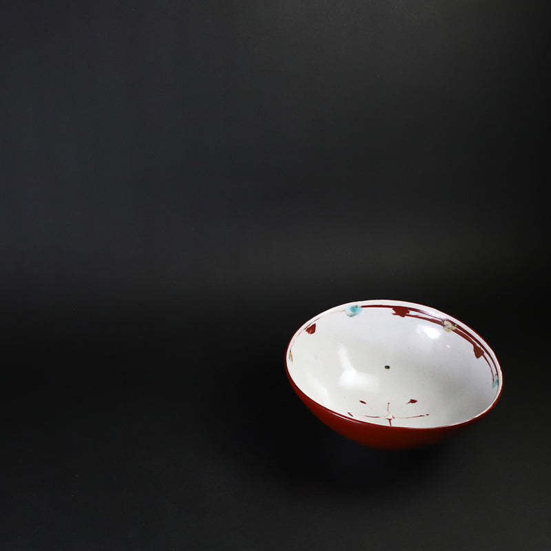 Red-painted dot patterned shoe-mounted bowl by Shingo Oka