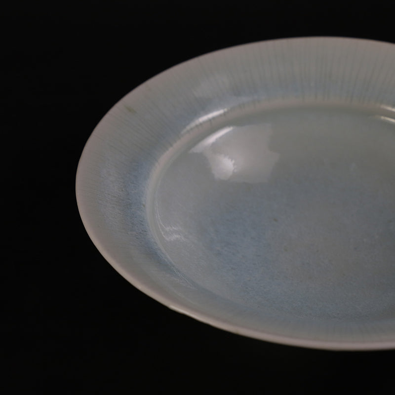 Oval bowl with blue and white porcelain ridges by Shuichi Okamoto