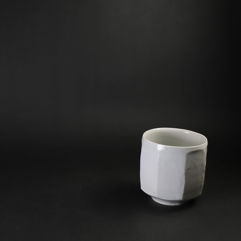 White porcelain teacup with beveled edges by Shingo Oka