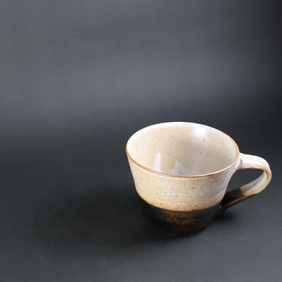 Hanging cup by Yukiko Tsuchiya