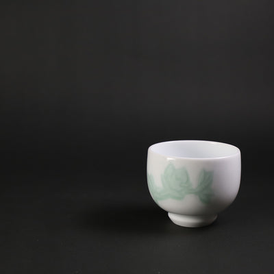 Manji Inoue's work, white porcelain, green glaze, magnolia carving design sake cup (small)