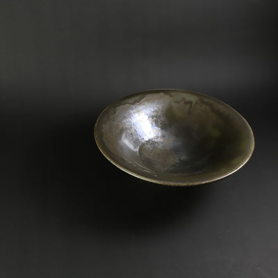 Yukiko Tsuchiya's work Black Karatsu-rimmed plate with kiln change