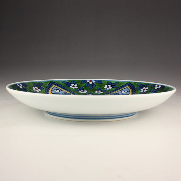 Gen-emon kiln Green color Iznik bowl with small flower design