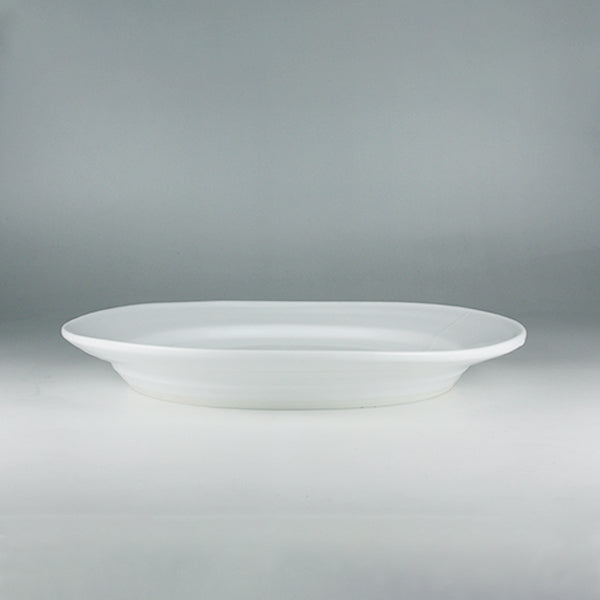 Karatsu white porcelain plate by Yukiko Tsuchiya